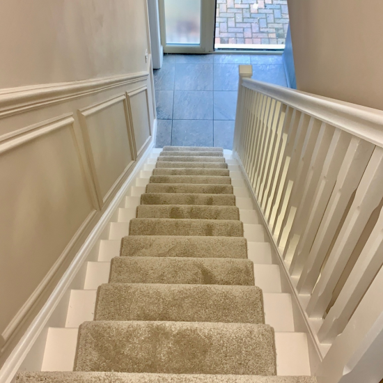 Carpeted set of stairs from top view